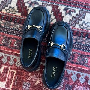 RAYE Black Loafers with Gold Buckle